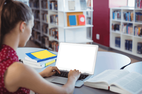 student in library with laptop and open books, screen transparent - Download Free Stock Videos Pikwizard.com