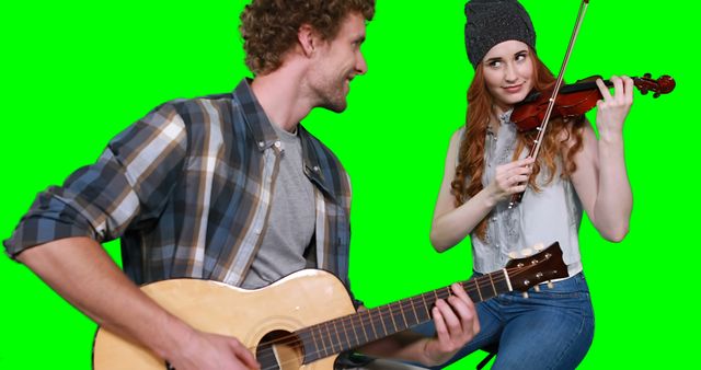 Young Musicians Playing Guitar and Violin on Green Screen - Download Free Stock Images Pikwizard.com