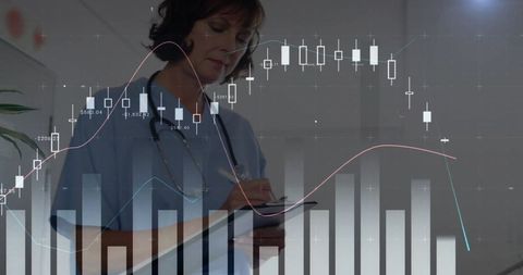 Caucasian doctor analyzing financial charts for healthcare insights