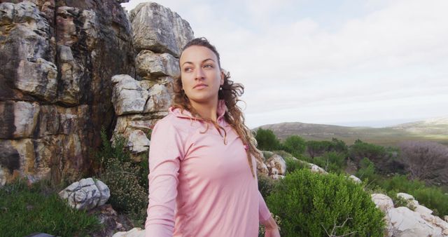 Woman With Curly Hair Enjoying Rock Climbing Adventure in Nature - Download Free Stock Images Pikwizard.com