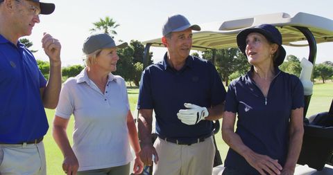 Active Seniors Enjoying Golf on Sunny Day - Download Free Stock Images Pikwizard.com