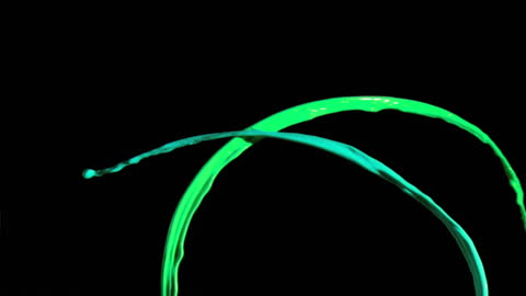 Vibrant Abstract Paint Splashing in Motion on Black Background