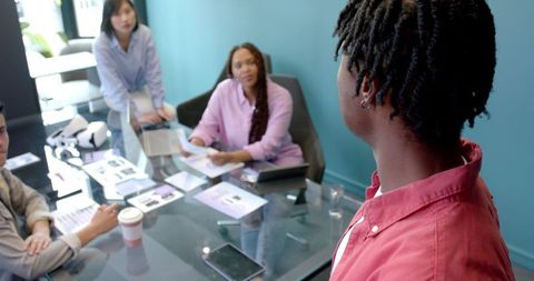 Businessman Presenting in Modern Office Meeting