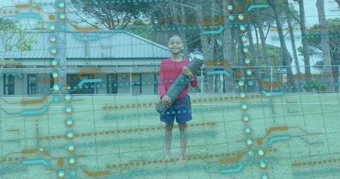 Energetic boy on sports field with tech circuit overlay