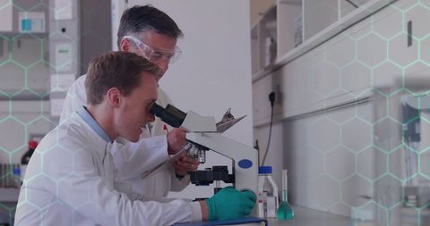 Scientists Conducting Microscope Research in Modern Laboratory - Download Free Stock Images Pikwizard.com
