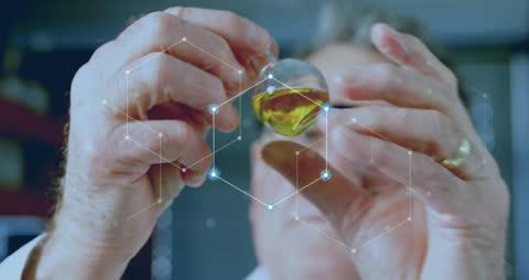 Scientist Examining Liquid Sample with Data Network Overlay