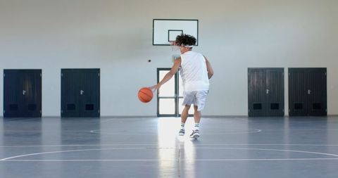 Skillful Dribbling Indoor Basketball Court Athletic Teen