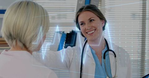Female Doctor Using Digital Cardiology Interface for Patient Examination - Download Free Stock Images Pikwizard.com