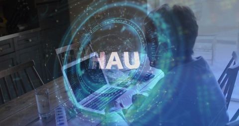 Senior woman touching laptop activating blue ar ring revealing personal health data