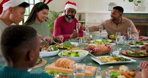 Diverse Family Celebrating Festive Meal Around Table
