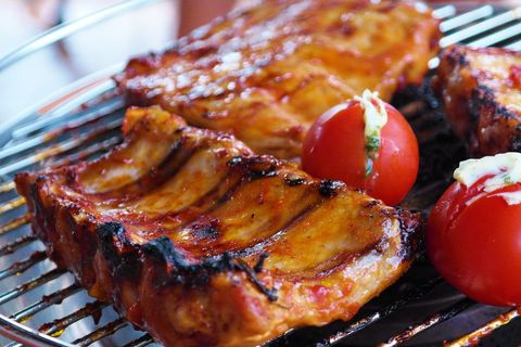 Grilling Glazed Barbecue Ribs with Stuffed Cherry Tomatoes and Smoky Charred Edges