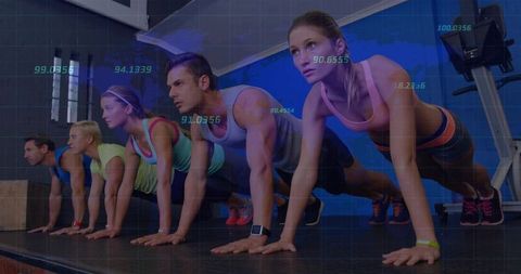 Group Plank Workout with Fitness Trackers in Gym