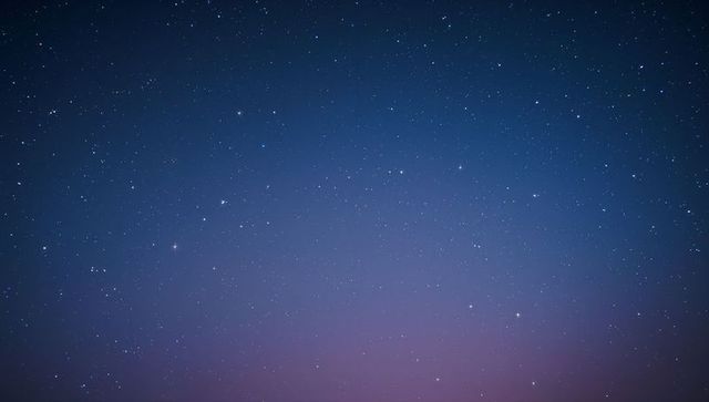 Twinkling Stars Stretching across Deep Blue Night Sky with Soft Twilight Gradient