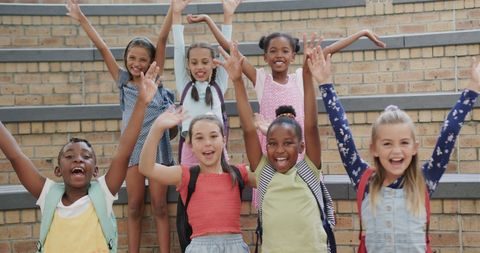 Happy Diverse Schoolgirls Celebrating Together