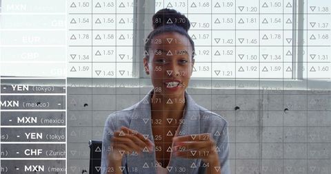 Business Professional Discussing Currency Exchange Rates Overlaid with Data