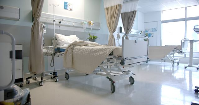 Empty Modern Hospital Room with Medical Equipment and Bed - Download Free Stock Images Pikwizard.com