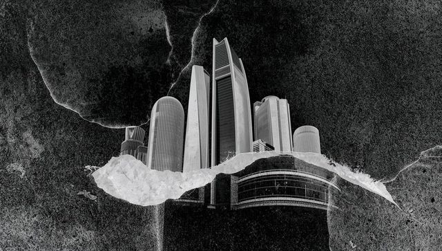 Monochrome skyscraper collage rising from torn paper on grained dark textured background