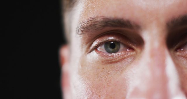 Close up portrait of face of caucasian man with focus on eye. human vision and sight, eye detail.