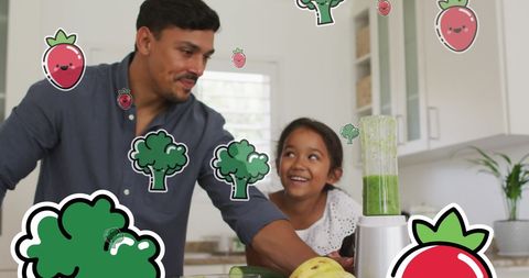 Father and Daughter Enjoying Healthy Smoothie Making