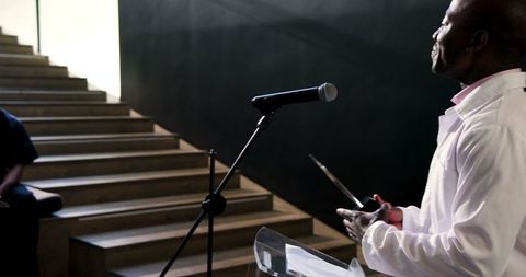 Doctor presenting award to colleague at ceremony