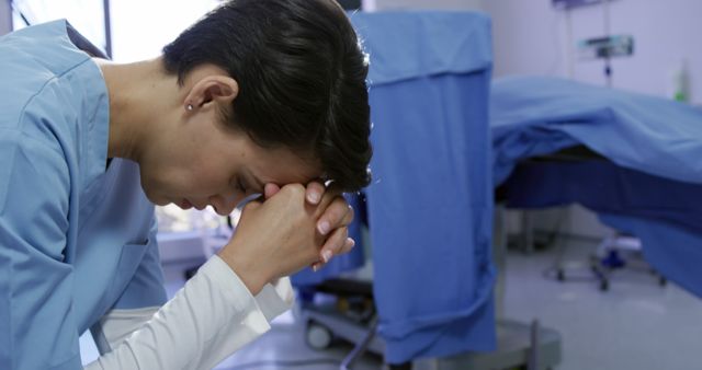 Stressed Medical Professional Taking a Break in Hospital Ward - Download Free Stock Images Pikwizard.com