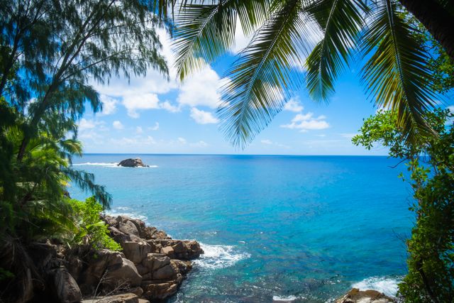 Scenic Tropical Ocean View from Rocky Coastline - Download Free Stock Photos Pikwizard.com