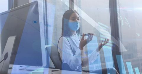 Female Professional Engaging in Virtual Communication at Modern Office