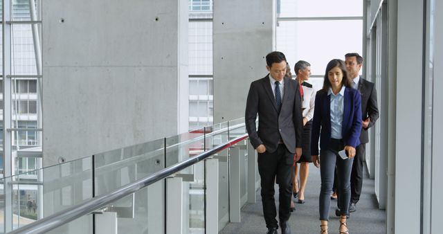 Group of Diverse Business People Walking Through Modern Office Hallway - Download Free Stock Images Pikwizard.com