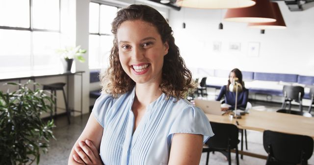 Confident Businesswoman Posing in Modern Office Space - Download Free Stock Images Pikwizard.com