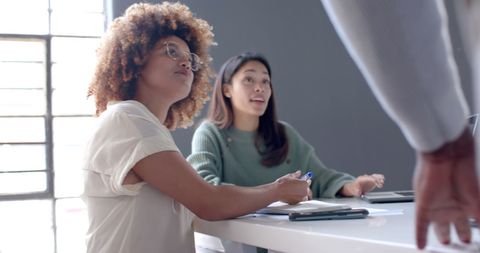 Diverse Professionals Collaborating in Casual Office