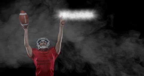Rugby Player Celebrating Victory Under Stadium Lights