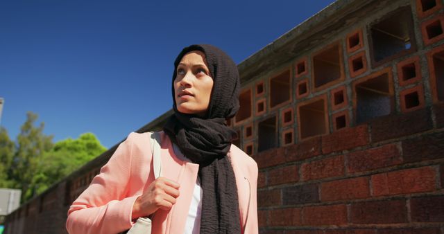 Confident Woman Wearing Hijab in Outdoor Urban Setting - Download Free Stock Images Pikwizard.com