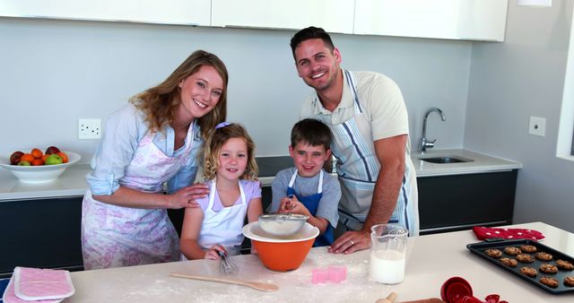 Happy Family Baking Cake Together in Home Kitchen - Download Free Stock Images Pikwizard.com