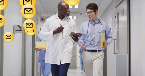 Diverse doctors discussing healthcare amid digital innovations