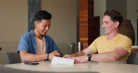 Happy Friends Sharing Laughter and Conversations in Relaxed Setting