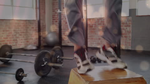 Man Performing Box Jumps in Industrial Gym Environment