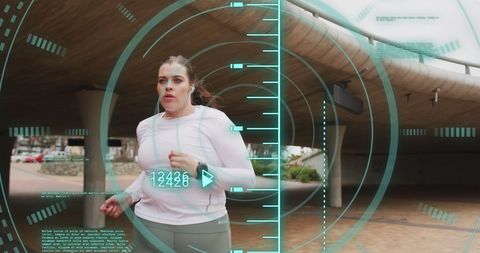 Fit woman jogging in city with augmented reality kr monitor