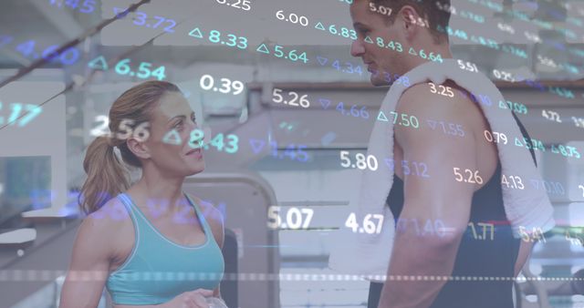 Athletes in Gym Discussing Fitness While Overlaid with Stock Market Data - Download Free Stock Images Pikwizard.com