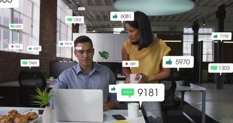 Diverse Professionals Analyzing Social Media Metrics in Modern Office