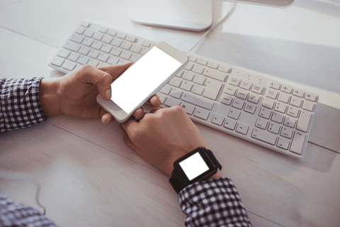 transparent screens on smartphone and smartwatch at office desk - Download Free Stock Videos Pikwizard.com