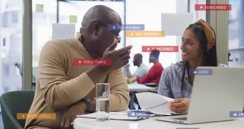 Diverse Colleagues Discussing Teamwork with Social Media Notifications