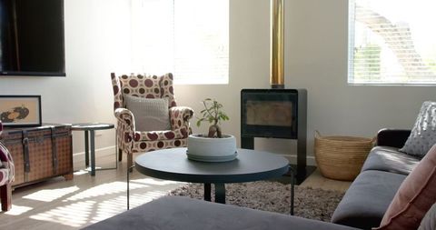 Contemporary Living Room with Fireplace and Retro Flair - Download Free Stock Images Pikwizard.com