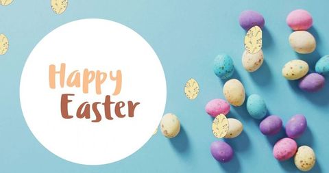 Colorful Easter Eggs and Greeting on Blue Background - Download Free Stock Images Pikwizard.com