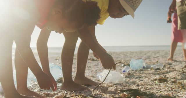 Children Participating in Beach Clean-Up Collecting Plastic Waste - Download Free Stock Images Pikwizard.com