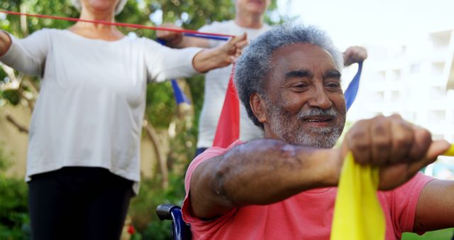 Senior man exercising outdoors with resistance bands - Download Free Stock Images Pikwizard.com