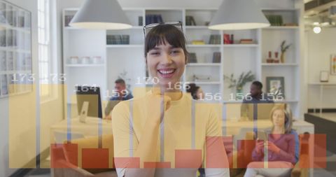 Woman Analyzing Business Growth Data in Modern Office