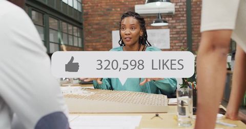 Architect Presenting Office Architectural Model with Interactive Discussion