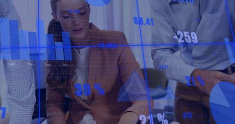 diverse team analysing financial data in office environment - Download Free Stock Images Pikwizard.com