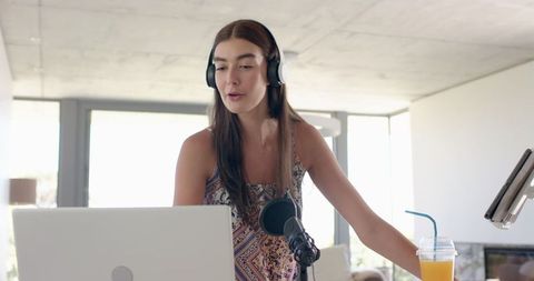 Teen Girl Using Laptop for Remote Learning