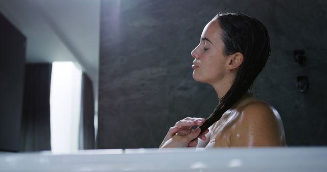 Young Woman Enjoying a Refreshing Shower - Download Free Stock Images Pikwizard.com